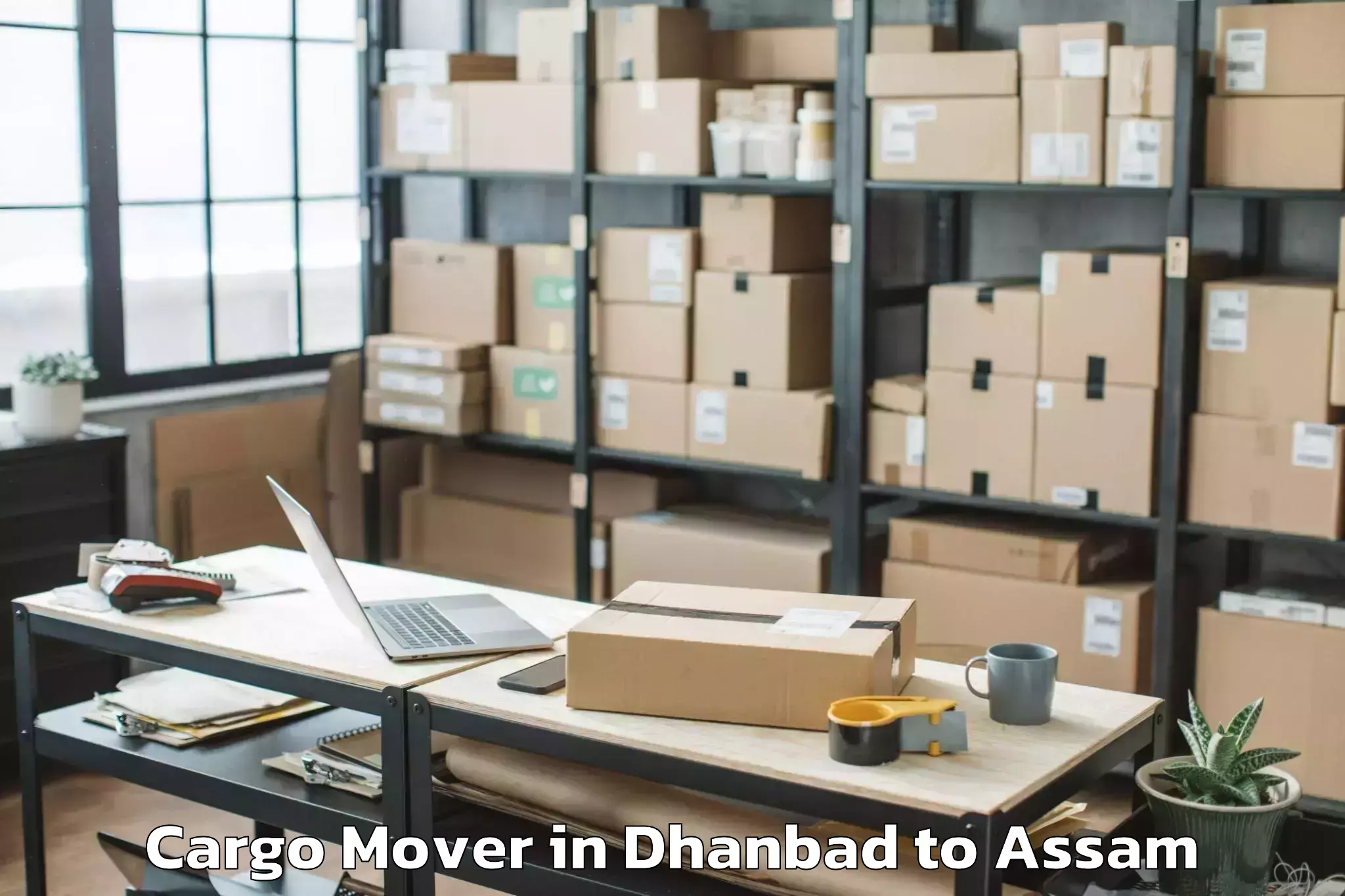 Book Dhanbad to Golokganj Pt Cargo Mover Online